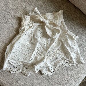 High Waisted White eyelet shorts with bow detail